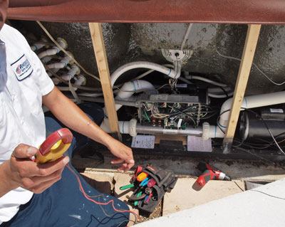 Though no two spas’

topside controls are exactly alike, some basic checks of the

panel’s exterior and interior can begin to help pinpoint a

power problem. If the spa is receiving power but the power light

fails to turn on, an investigation of the underlying wires may be

in order.