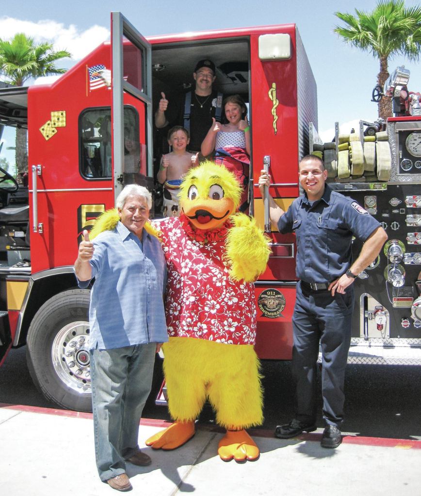 Joe Vassallo, Paragon Pools’ president, and Duckie, the Float Like A Duck mascot, invite families to join them for the 10th Annual Paragon Pools water safety event.