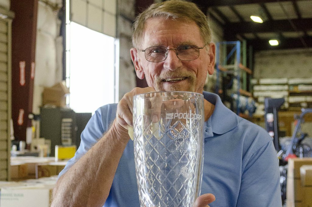 Marshall Richardson, president and founder of Tara Manufacturing, with PoolCorp's Vendor of the Year Award
