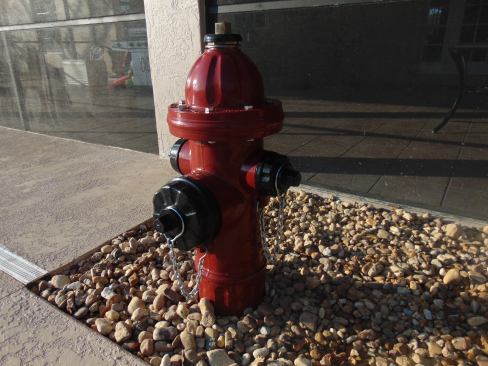 A fire hydrant accent reminds of Avilez's service.