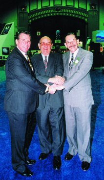 Three officials shake hands at the 1988 Atlantic City Pool & Spa Show. Pictured left to right are NESPA Past President Lester Kowalski, former director of the Atlantic City Convention Hall Howard Persina, and NESPA’s first full-time executive director, Joel Caesar.