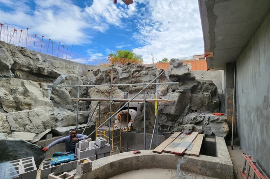 The artificial rock will be used throughout the grotto and slide area.
