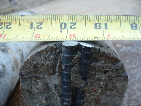 These photos show shadowing, in which shotcrete fails to properly
compact behind the rebar. Air voids in the space between bars
contributed to the cracking of a pool shell.