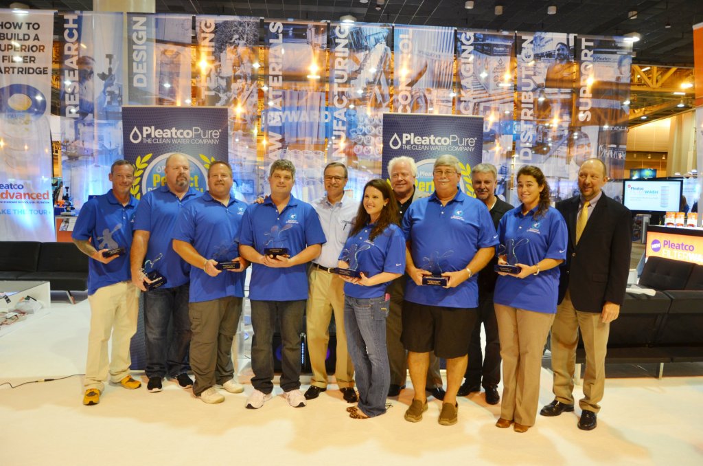 Pleatco expanded its awards program to include seven winners in 2016. Pictured left to right: Todd Riddick, Backyard Hero Award; Mark Howard, Big Heart Award; Jason Lehmann, Industry Leadership Award; Perfect Pool Guy Cory Eagles; Pleatco CEO Howard Smith; Erin Thibodeau, Outstanding Service Award; Brian Van Bower, Genesis; Douglas Hoerber, Lifetime Achievement Award; Skip Phillips, Genesis; Perfect Pool Gal Jennifer Del Vaglio; and Thomas Lachocki, NSPF.