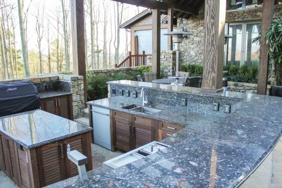 Materials: The kitchen has Ipe cabinetry and counters made of fossilized marble from Morocco.